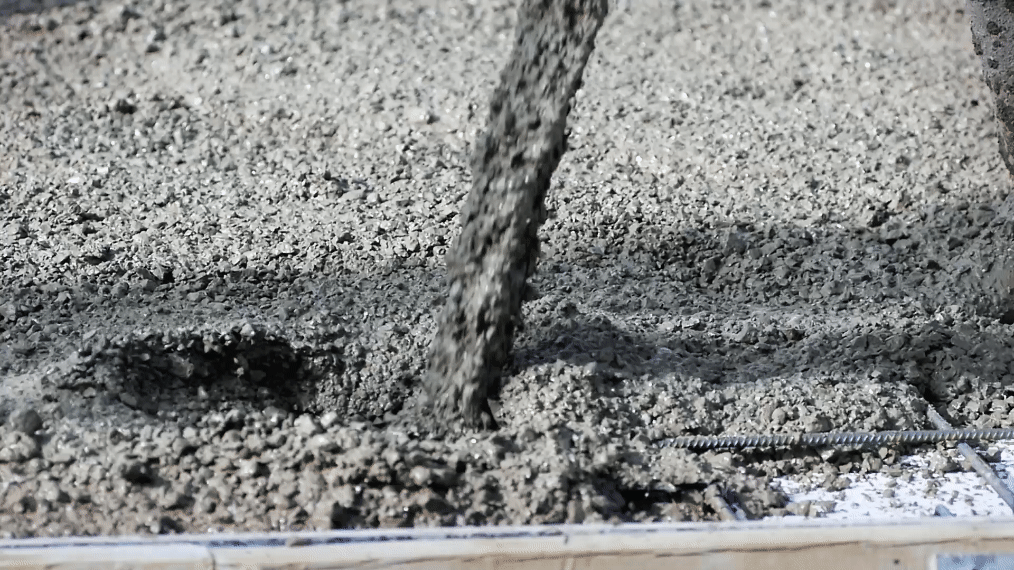 Animated GIF of concrete pouring into slab with rebar reinforcement
