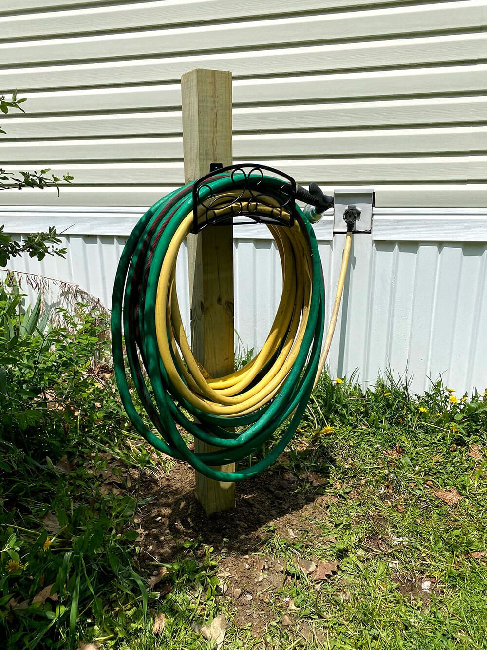 Garden hose hanger discount