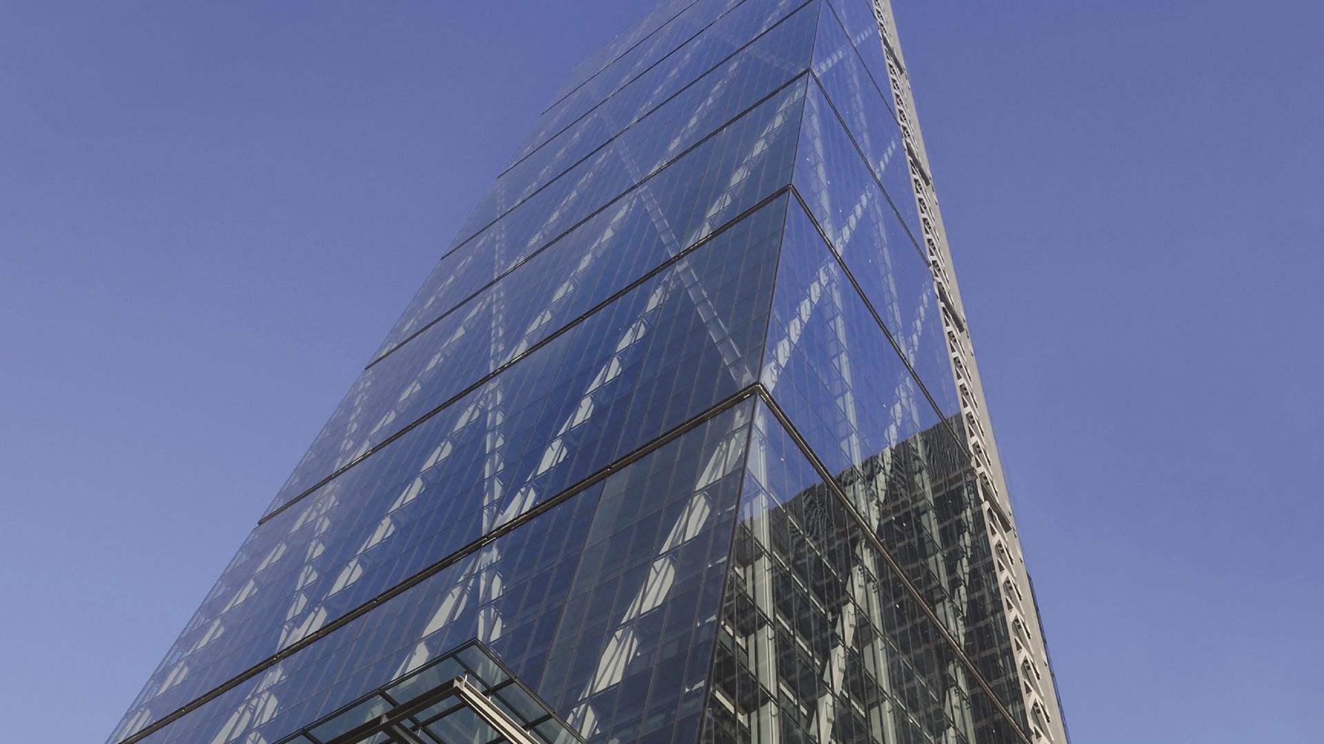 The Leadenhall Building, informally known as the Cheesegrater, catches the light of the morning sun in The City of London. The skyscraper is the latest addition to the constantly evolving skyline of the capitals thriving financial district.