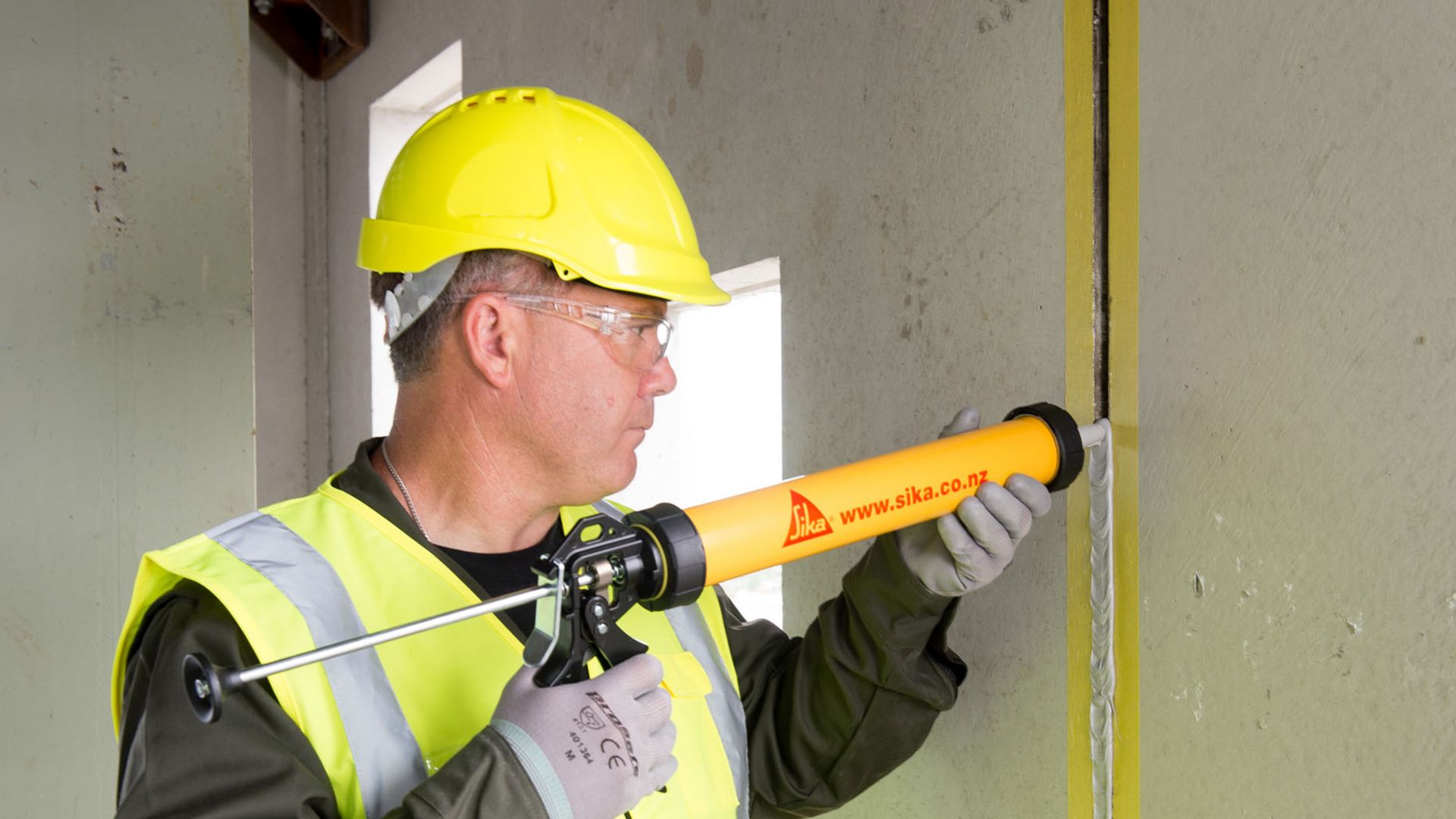 Man applying Sika joint sealant