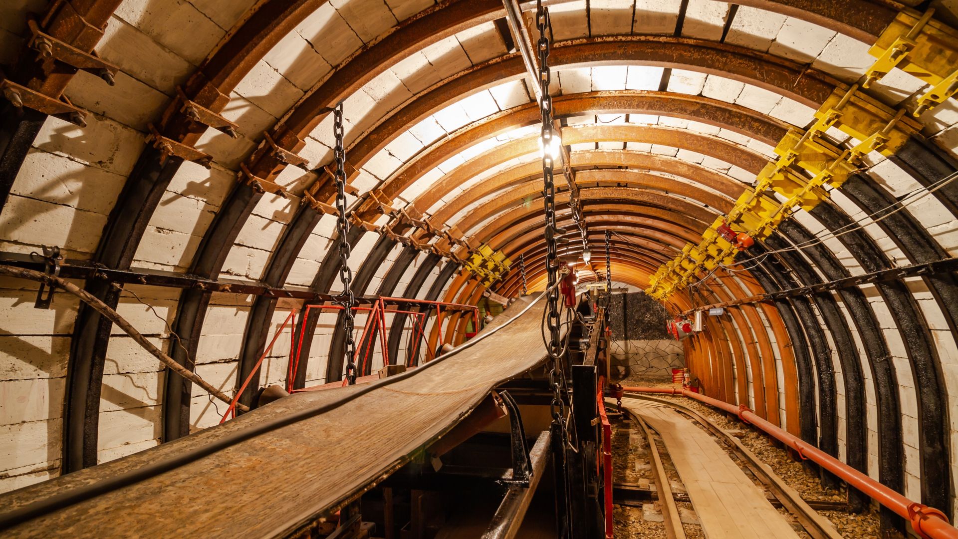 Empty conveyor belt in underground coal mine. Crisis in the mining industry