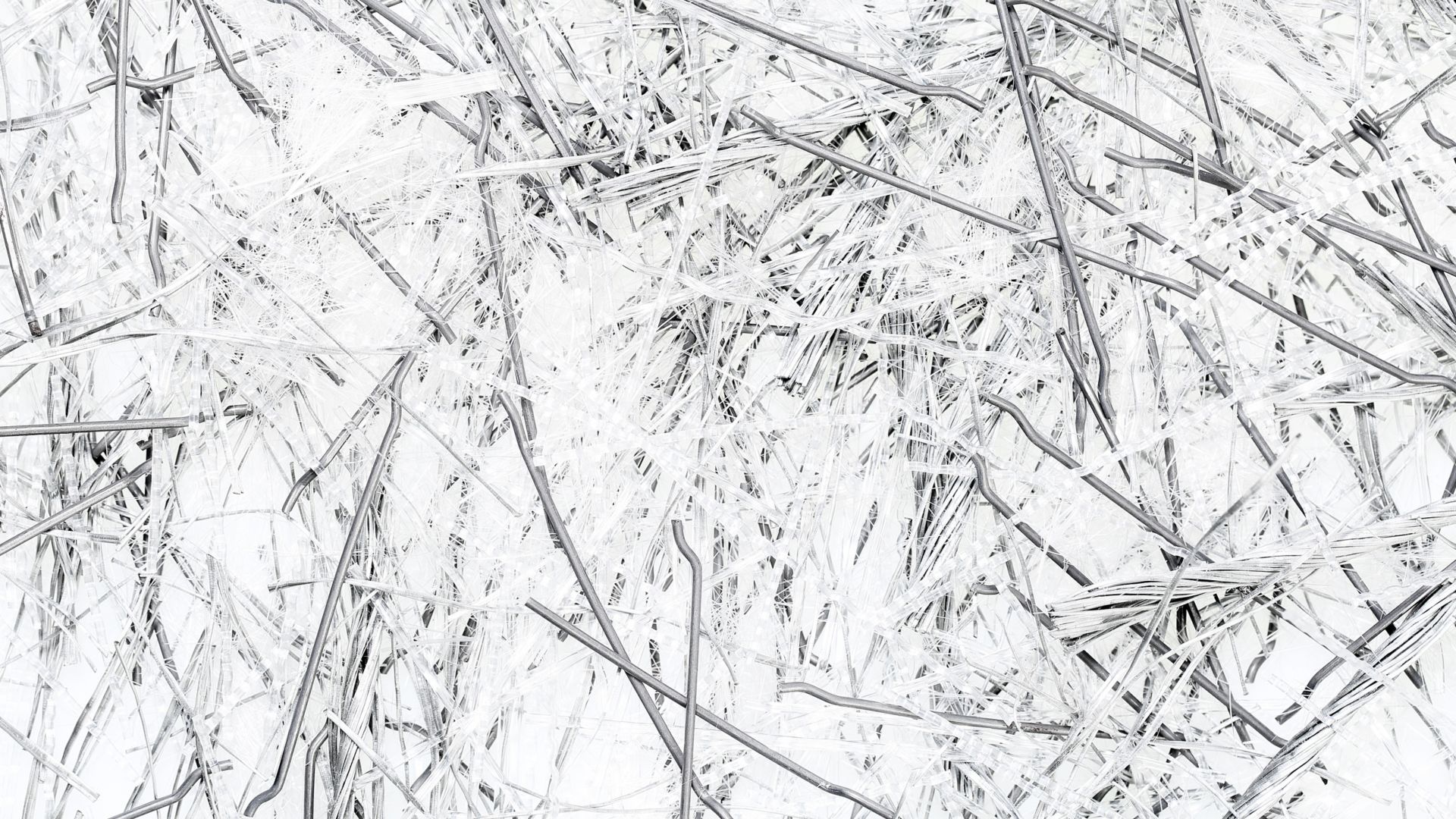 近距离，自上而下的视图，不同类型的混合聚丙烯和钢纤维的混凝土结构加固和避免早期开裂问题。建筑行业