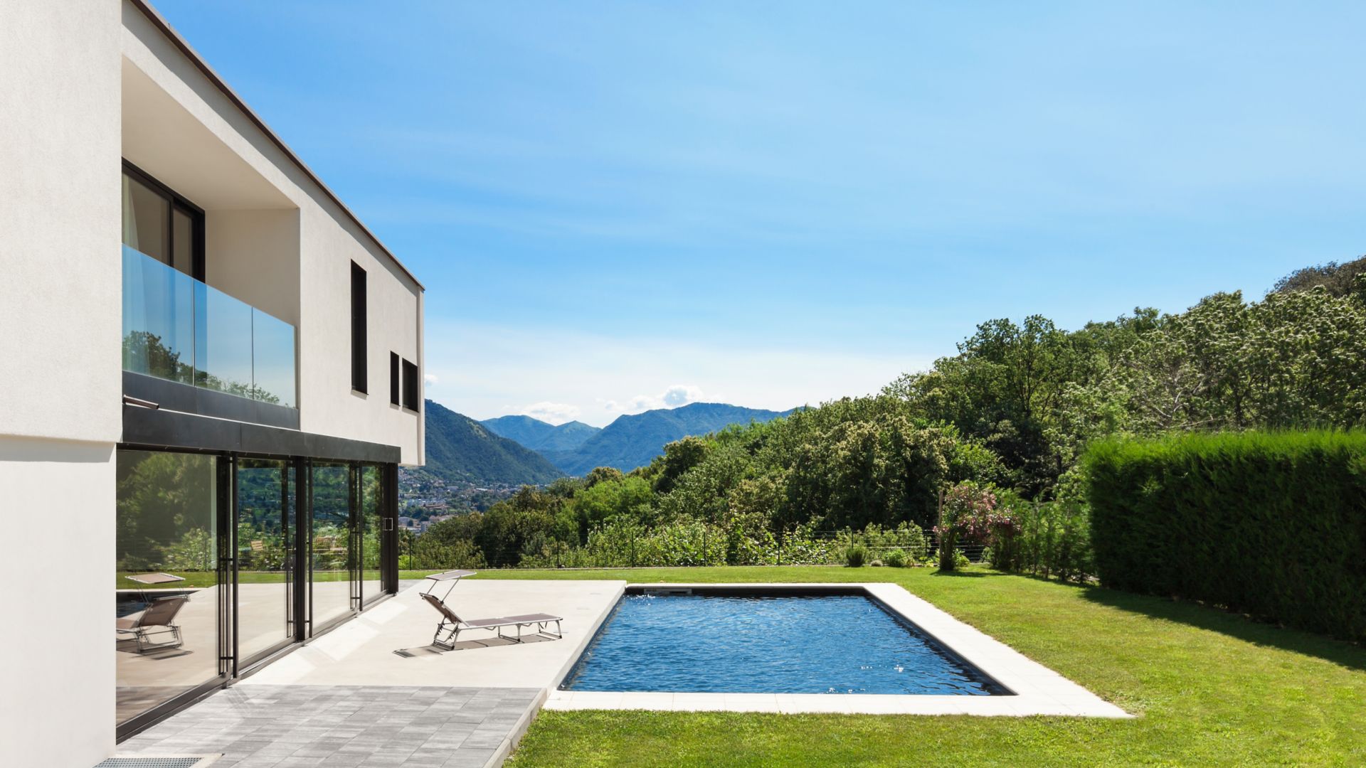 Modern villa with pool, view from the garden