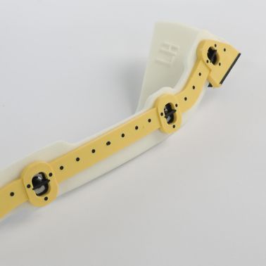 Injection molded acoustic SikaBaffle with attachment features
