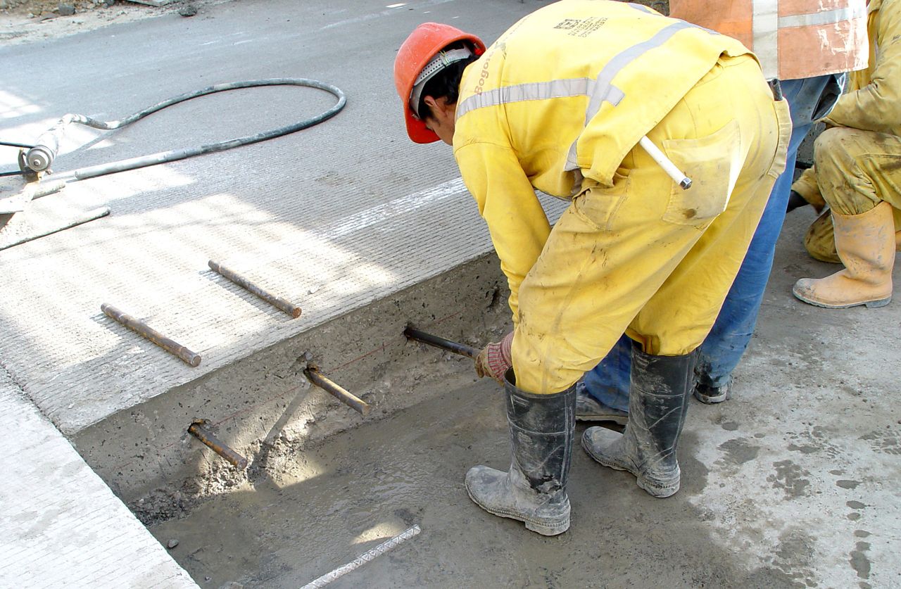 Man Applying Sika AnchorFix at a construction