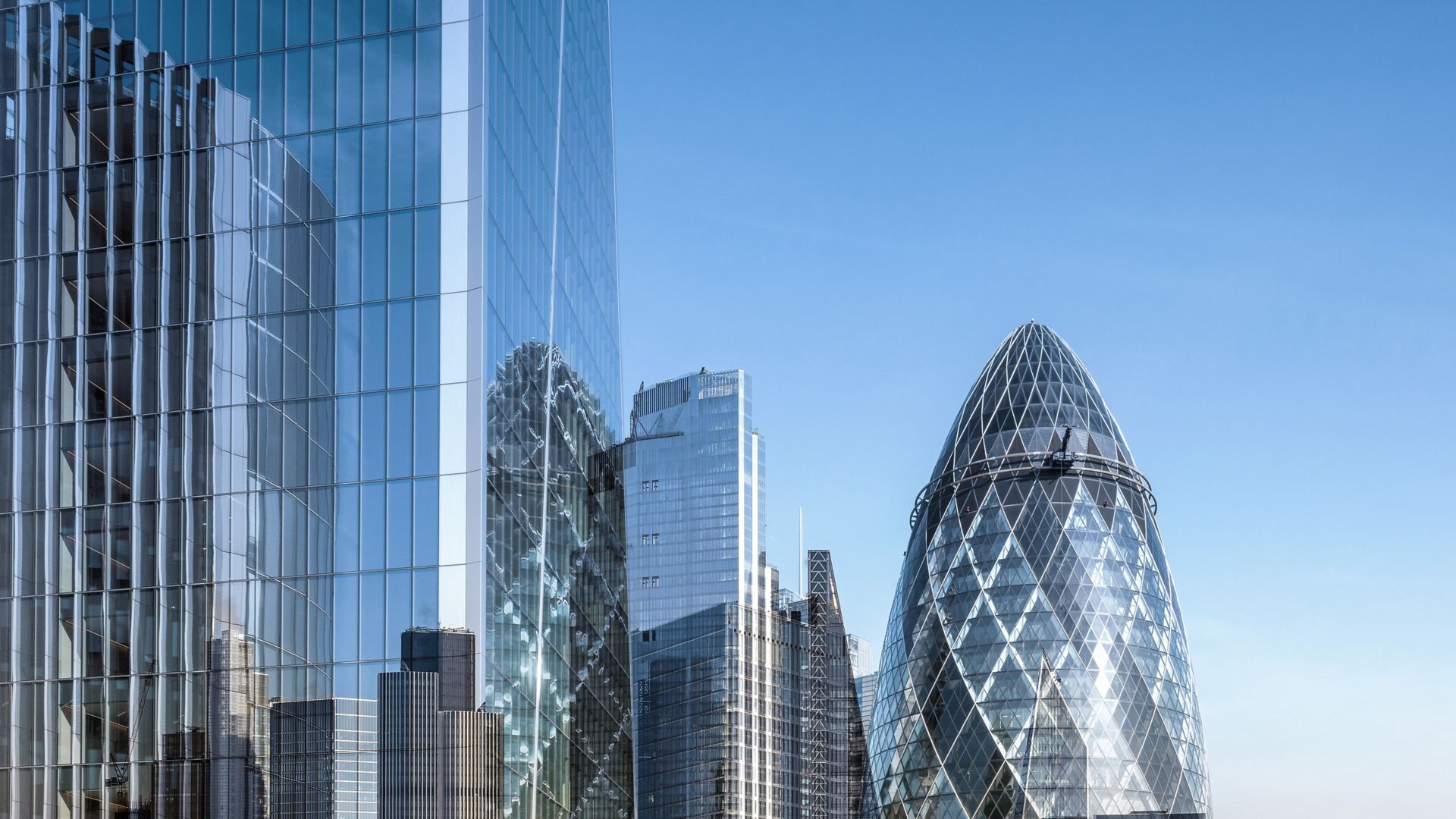 UK, London, digital composite of the city skyline with Canary Wharf in the distant