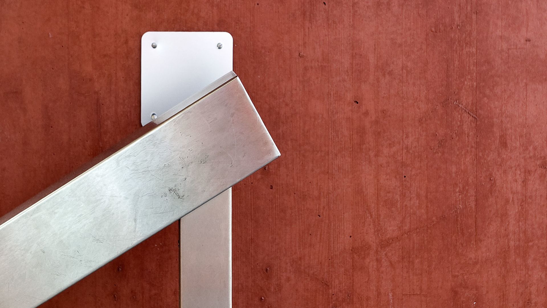 Red architectural concrete wall produced with Sika concrete admixtures