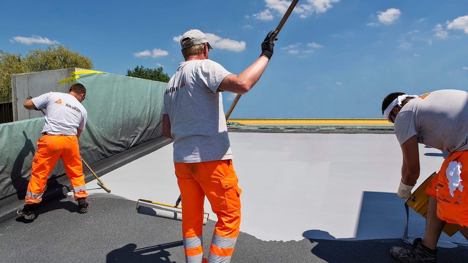 Construction work on a top deck of a car parking garage