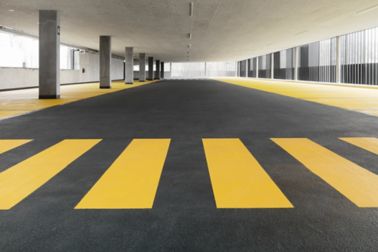 Colorful floor coating in car parking garage