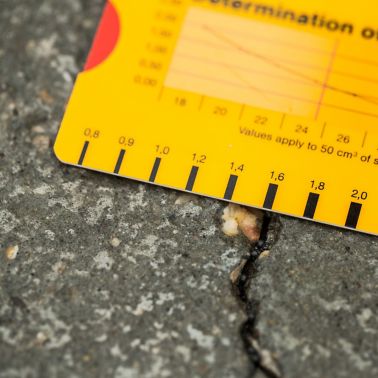 1,6 mm wide crack on the floor of a parking garage