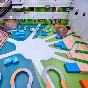 Sika ComfortFloor® blue and green floor at Revius Lyceum school lobby in Netherlands