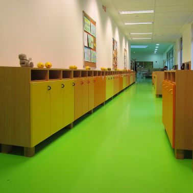 Sika ComfortFloor® green floor at kindergarden in locker hallway