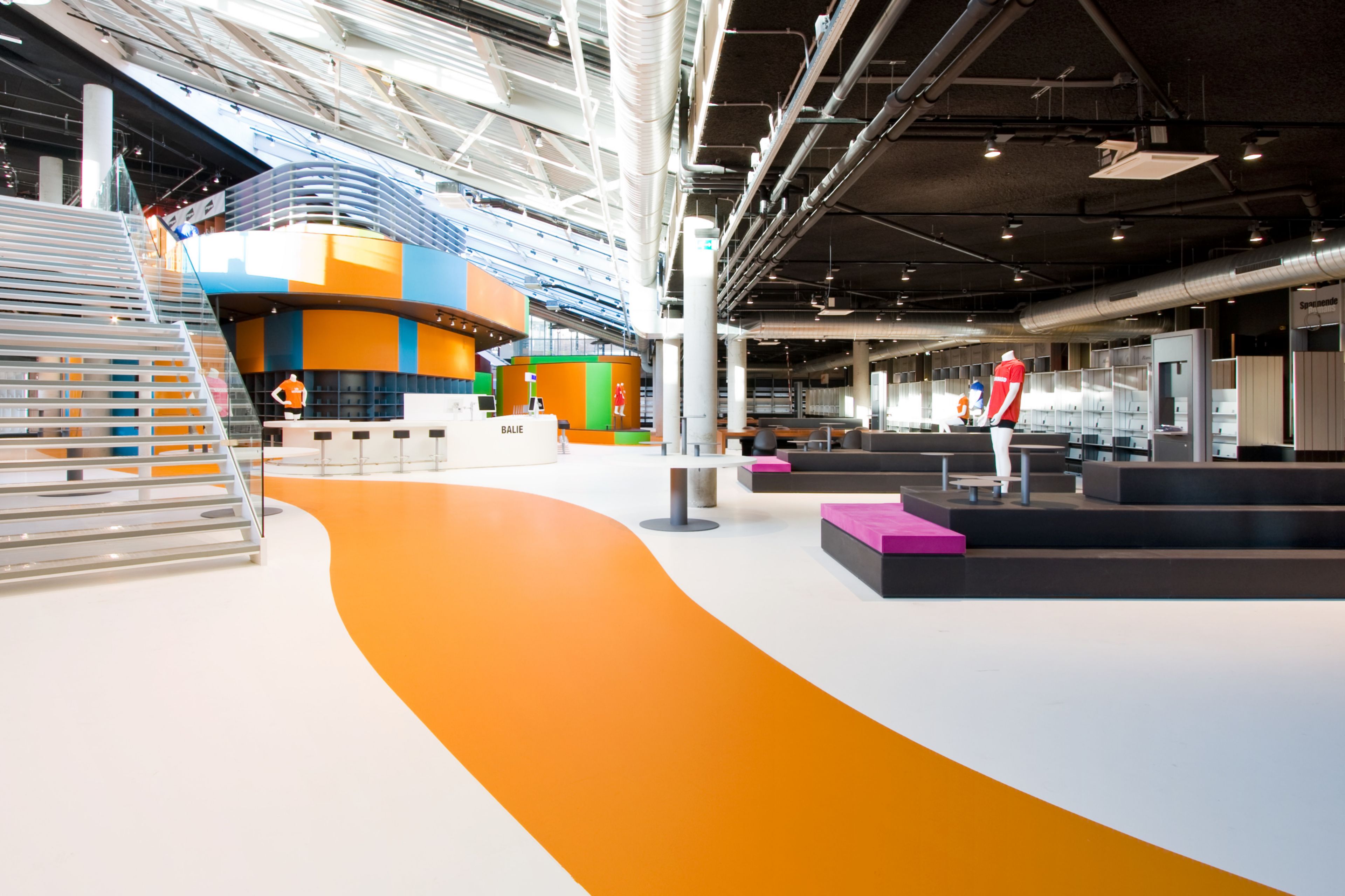 Sika ComfortFloor® orange and white floor in retail shop in Lelystad, Netherlands
