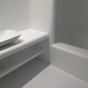 Sika ComfortFloor® white floor in modern white bathroom in hotel