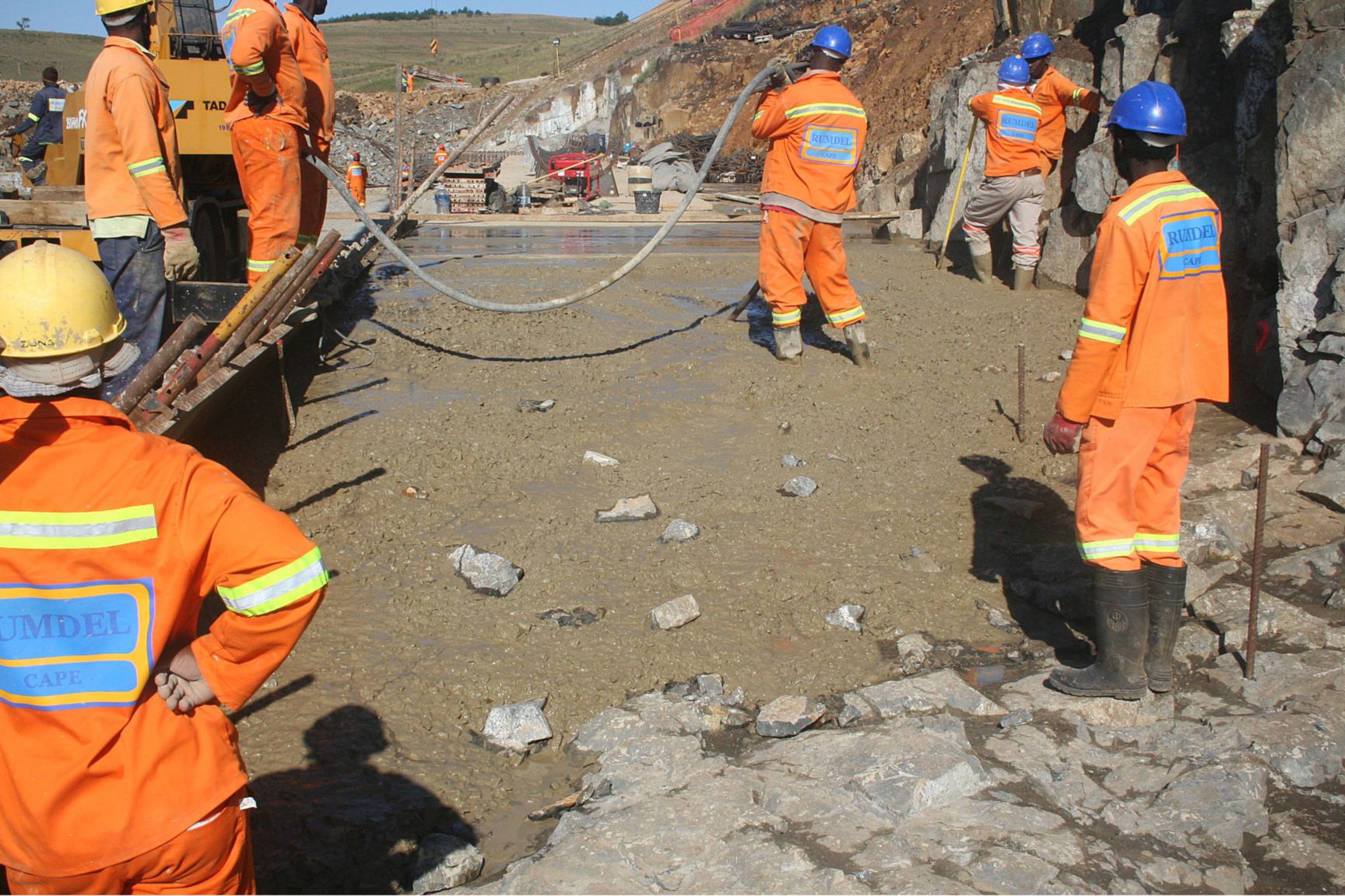 Workers pouring concrete produced with Sika admixtures
