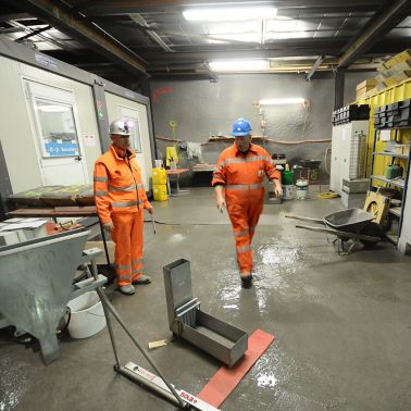 Concrete specialists working at dam in Wallis, Switzerland