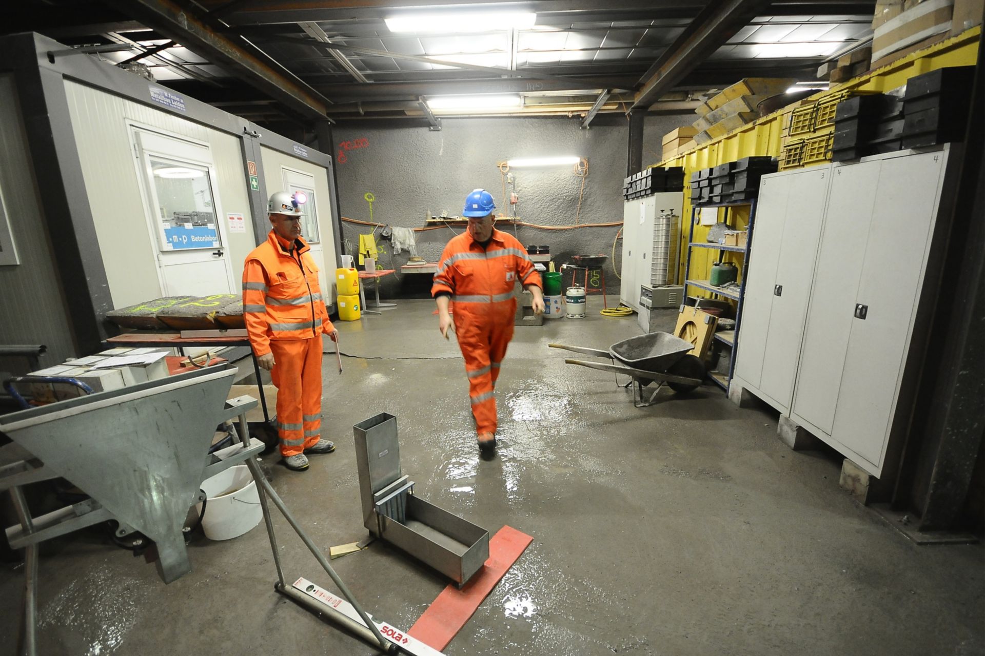 Concrete specialists working at dam in Wallis, Switzerland