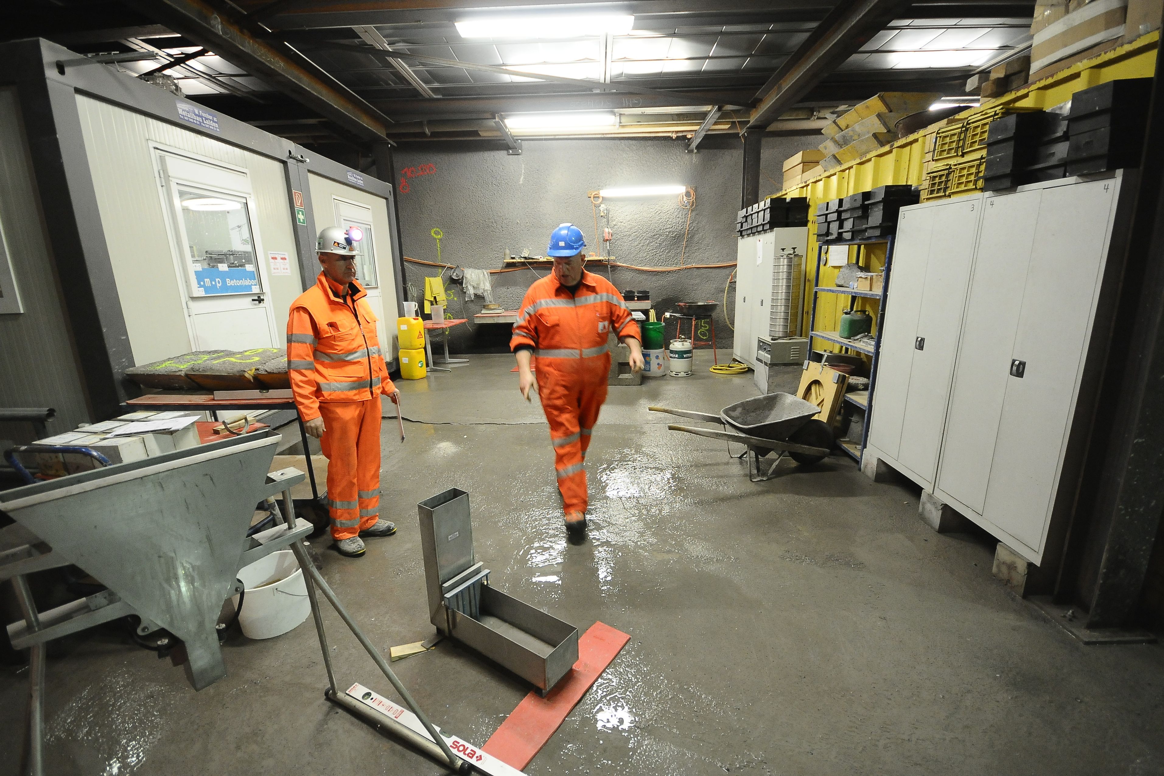 Concrete specialists working at dam in Wallis, Switzerland
