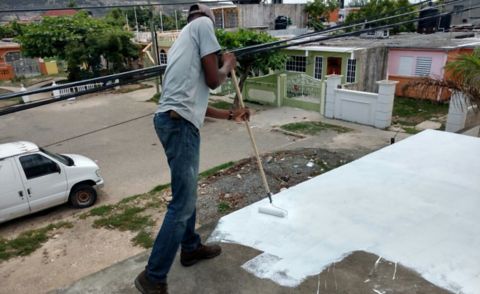Application of cool roof system on residential building