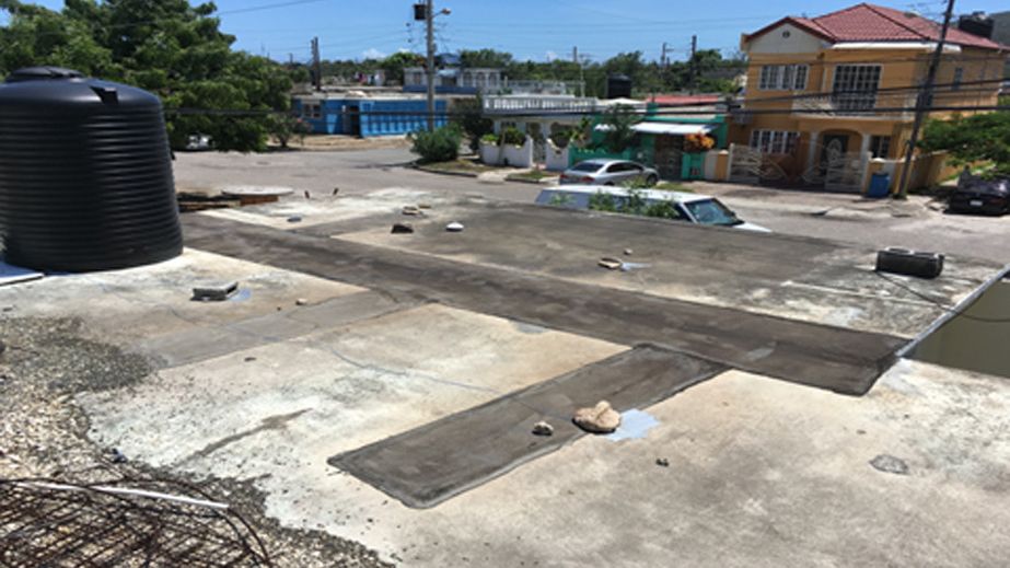 Damaged old roof on residential building