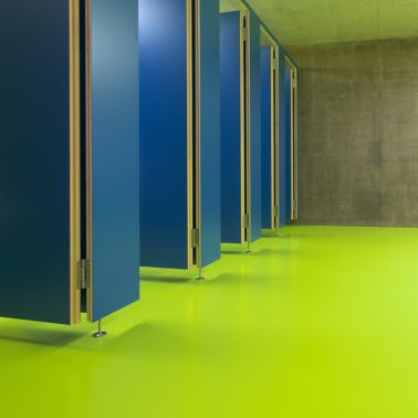 Decorative bathroom floor with Sikafloor at Seeblick Sport Center in Switzerland