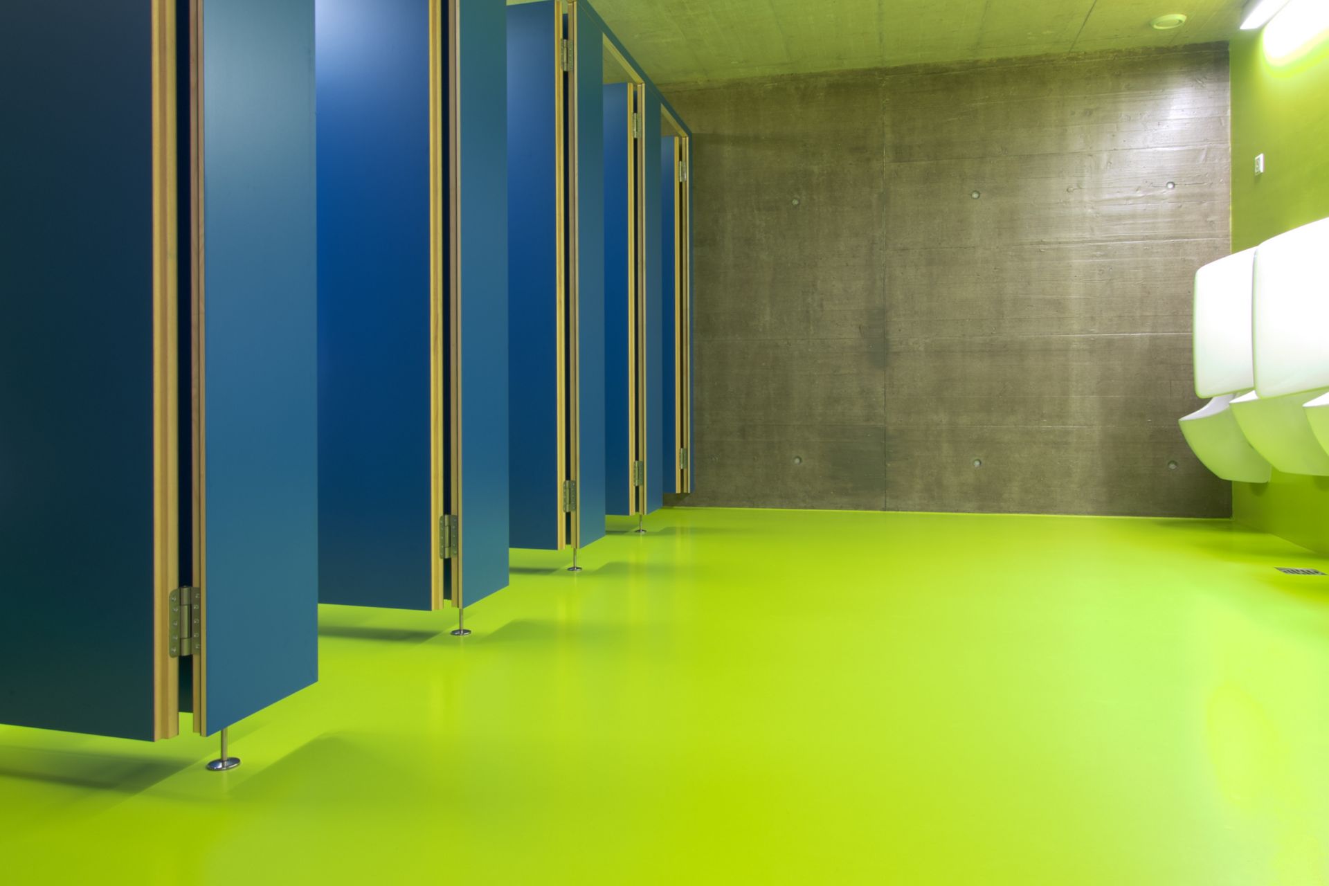 Decorative bathroom floor with Sikafloor at Seeblick Sport Center in Switzerland