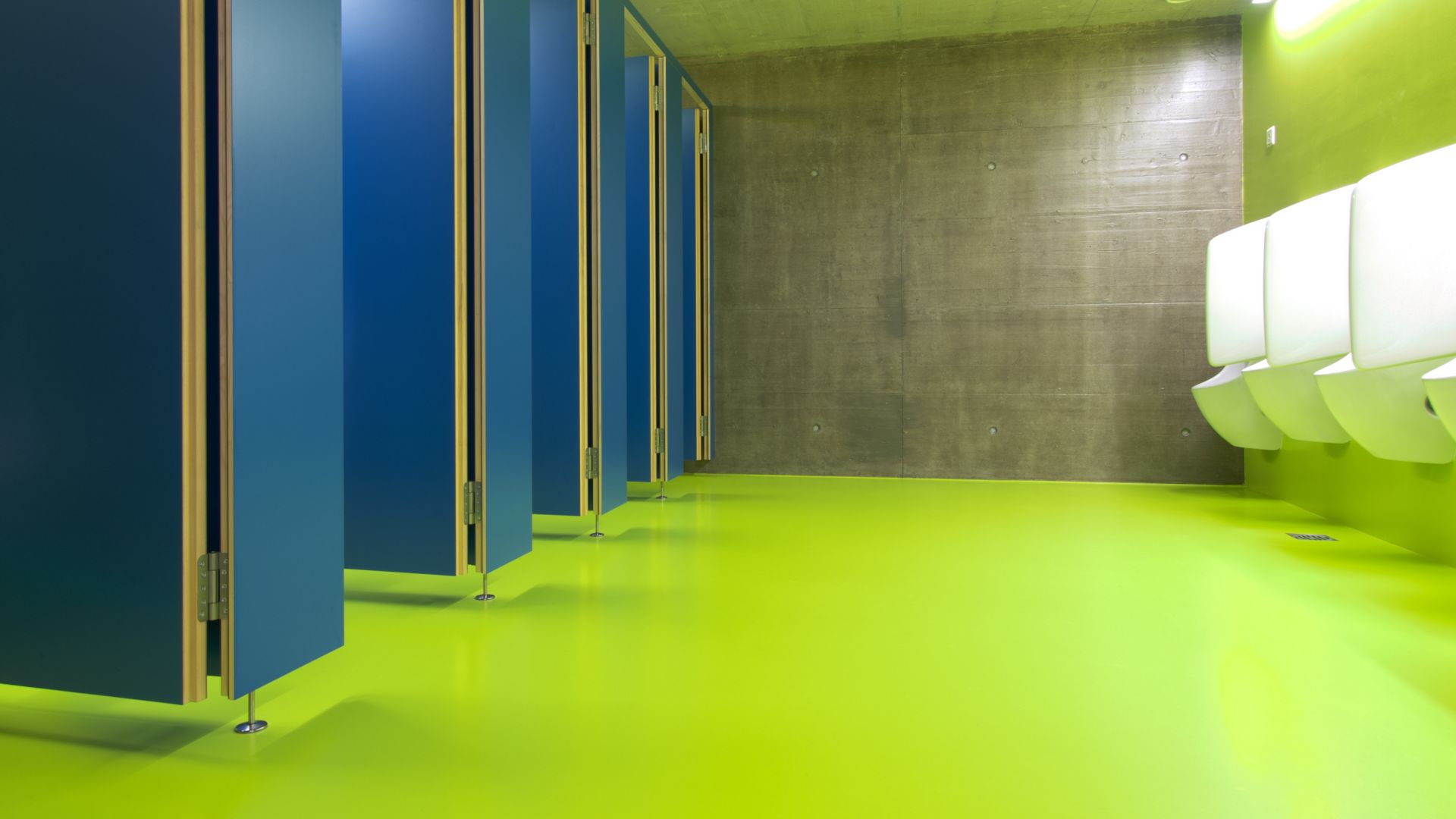 Decorative bathroom floor with Sikafloor at Seeblick Sport Center in Switzerland