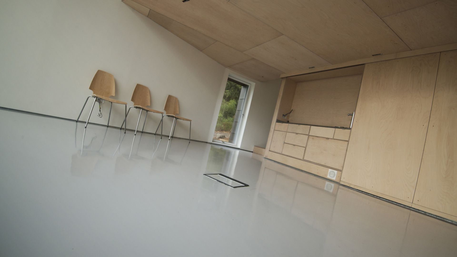 Decorative kitchen floor in school with Sikafloor