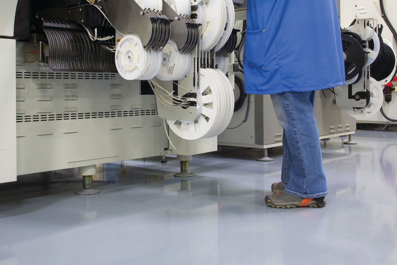 Man standing on industrial floor covered with Sikafloor ESD flooring system