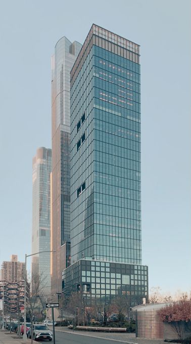 High-rise building with glass facade. Project 55 Hudson Yards.