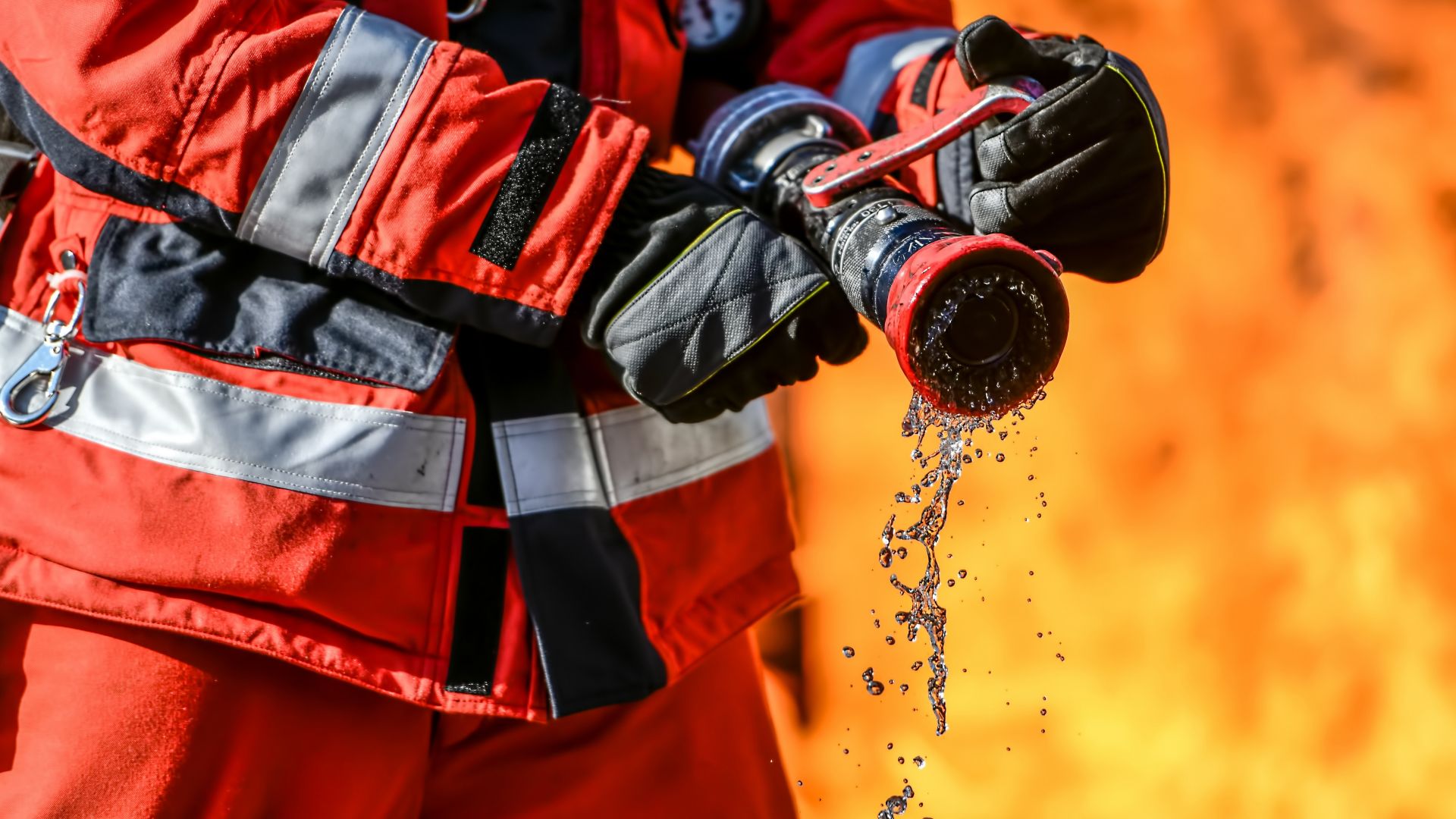 Fireman extinguish the fire with water