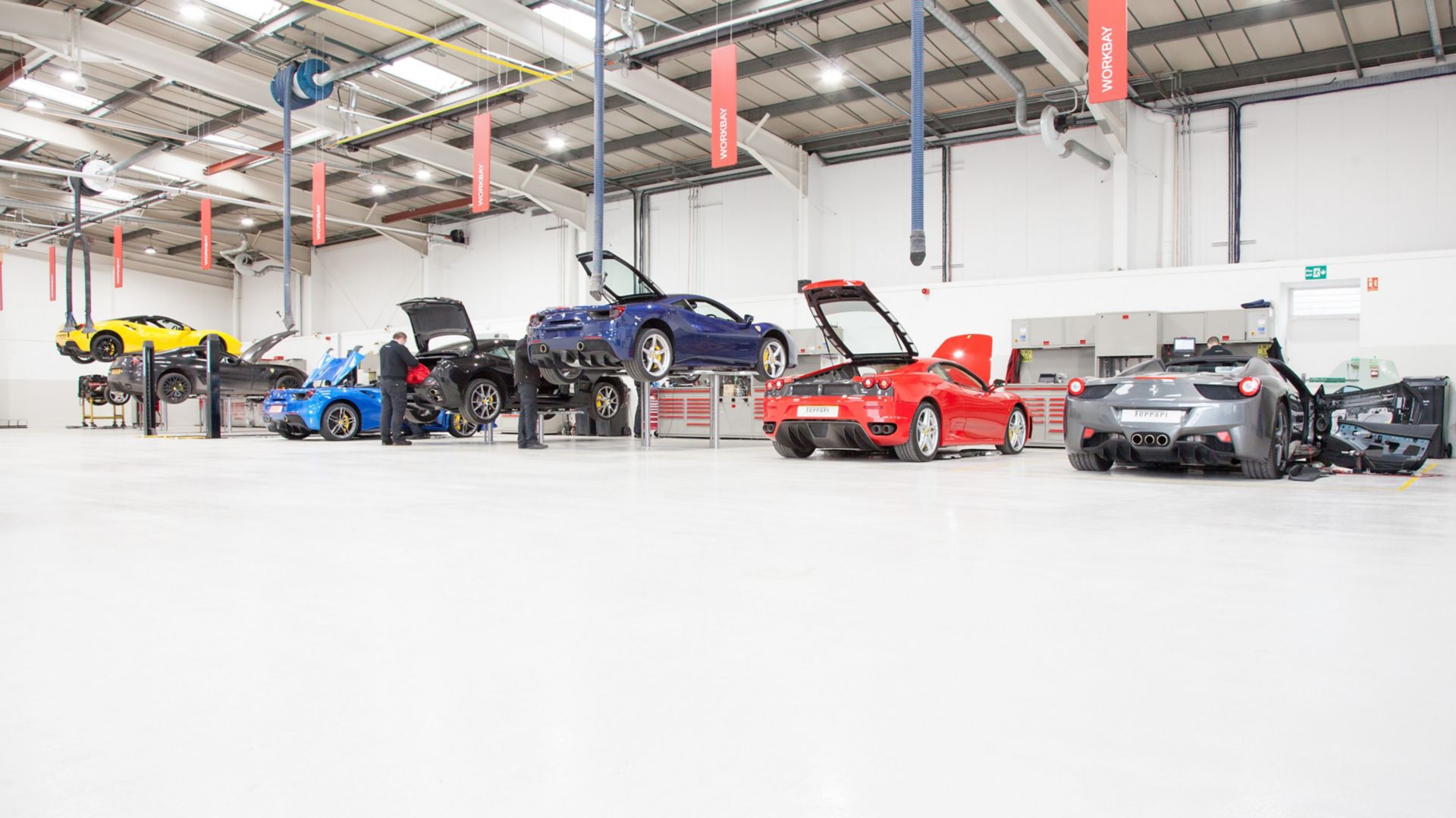 High gloss surface of Sikafloor system in Ferrari car repair workshop