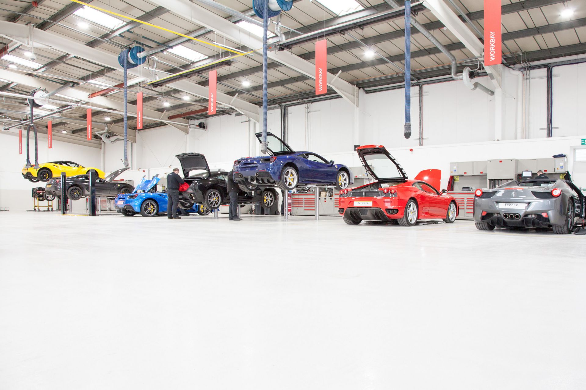 High gloss surface of Sikafloor system in Ferrari car repair workshop