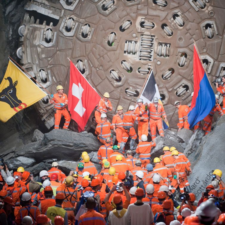 Construction workers celebrating inside Gotthard Tunnel in Switzerland