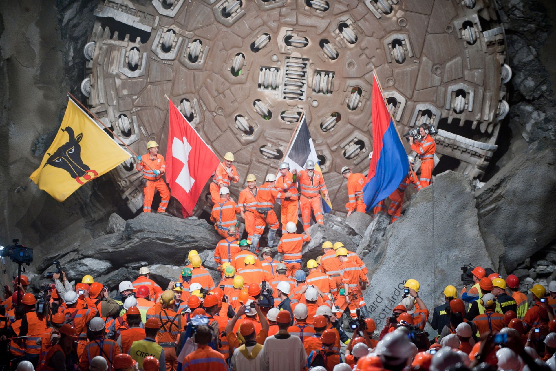 Construction workers celebrating inside Gotthard Tunnel in Switzerland