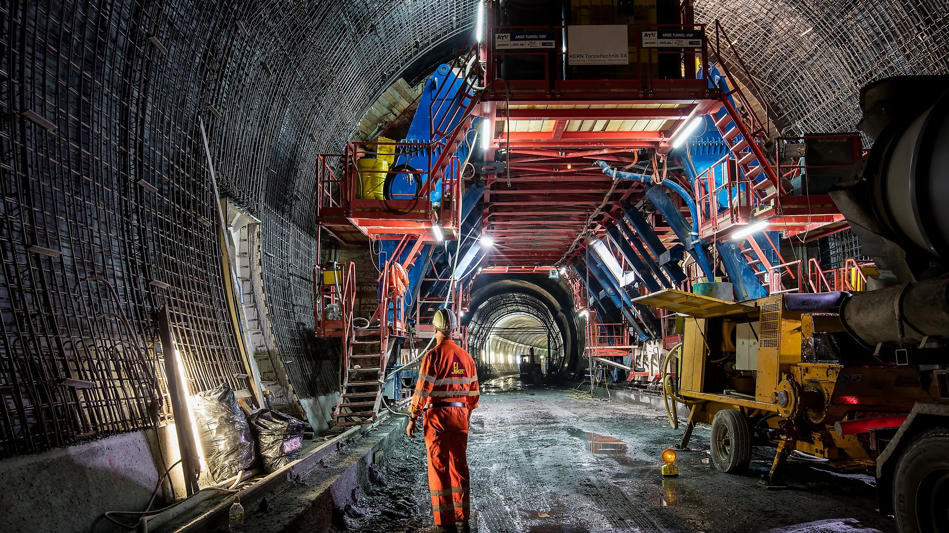 Construction worker standing  inside Gotthard Tunnel in Switzerland