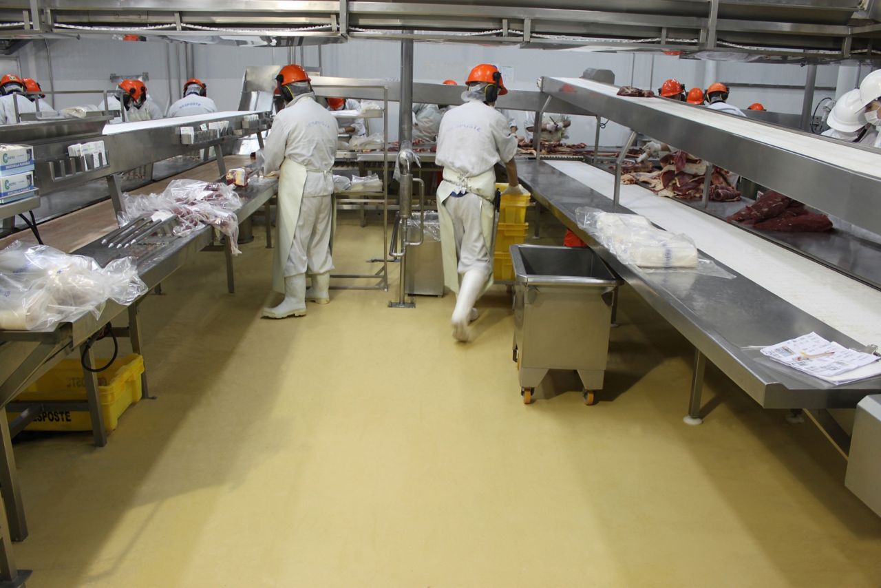 Industrial floor coating with Sikafloor resin cementitious flooring system in food facility