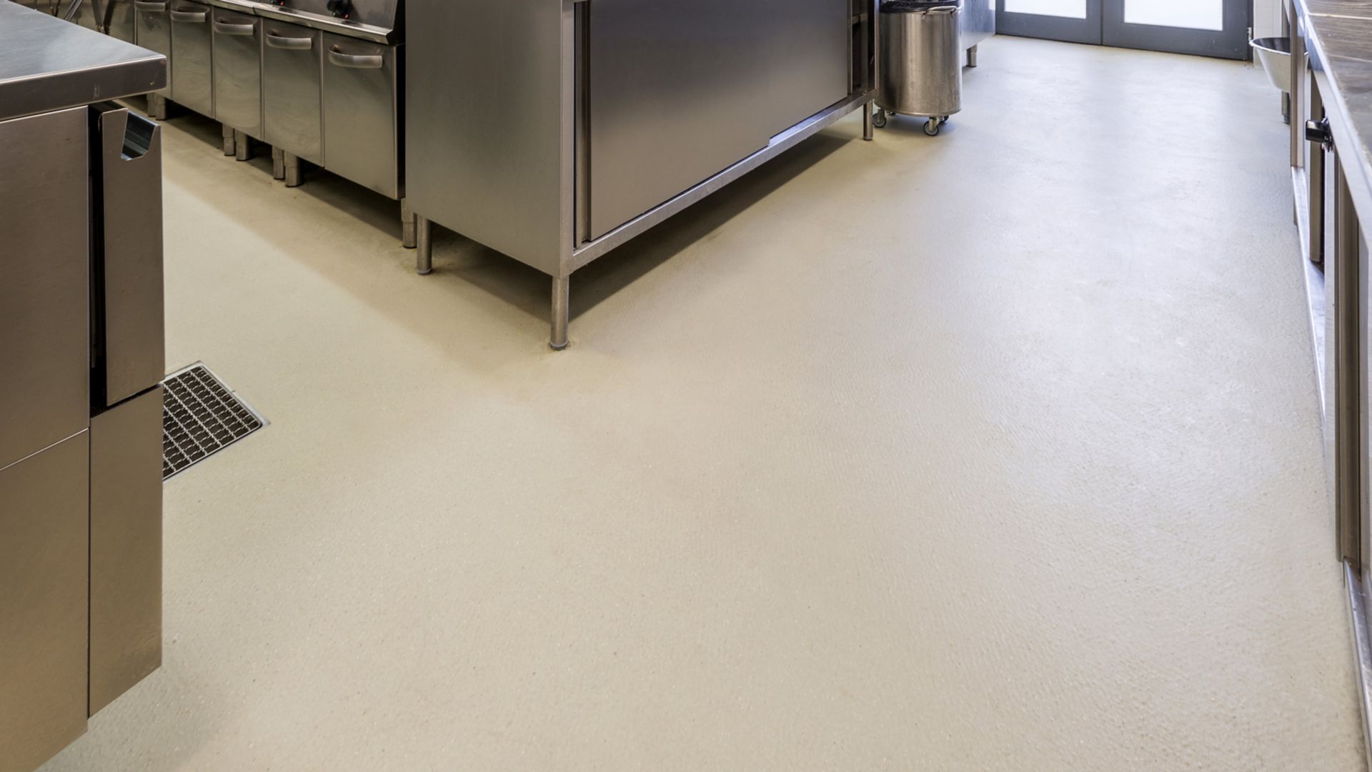 Industrial floor coating with Sikafloor resin cementitious flooring system in food facility