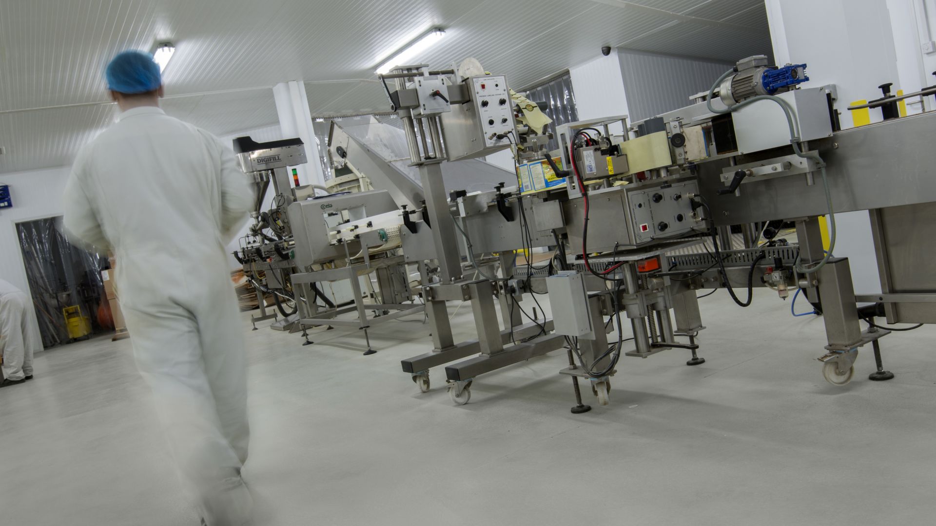 Industrial floor coating with Sikafloor resin cementitious flooring system in food facility