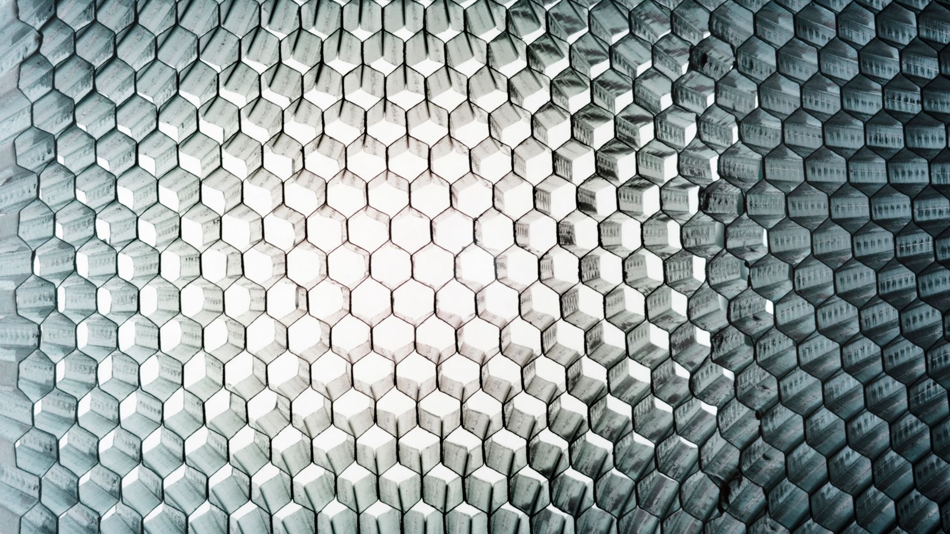 Studio close-up of a honey-comb metal panel, light-weight, sturdy and flexible. Colour-Toned. AdobeRGB