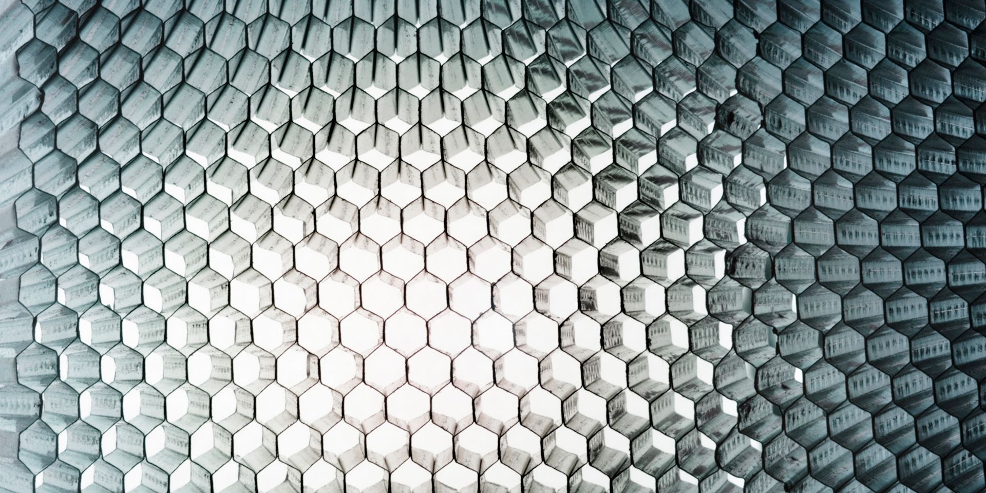 Studio close-up of a honey-comb metal panel, light-weight, sturdy and flexible. Colour-Toned. AdobeRGB