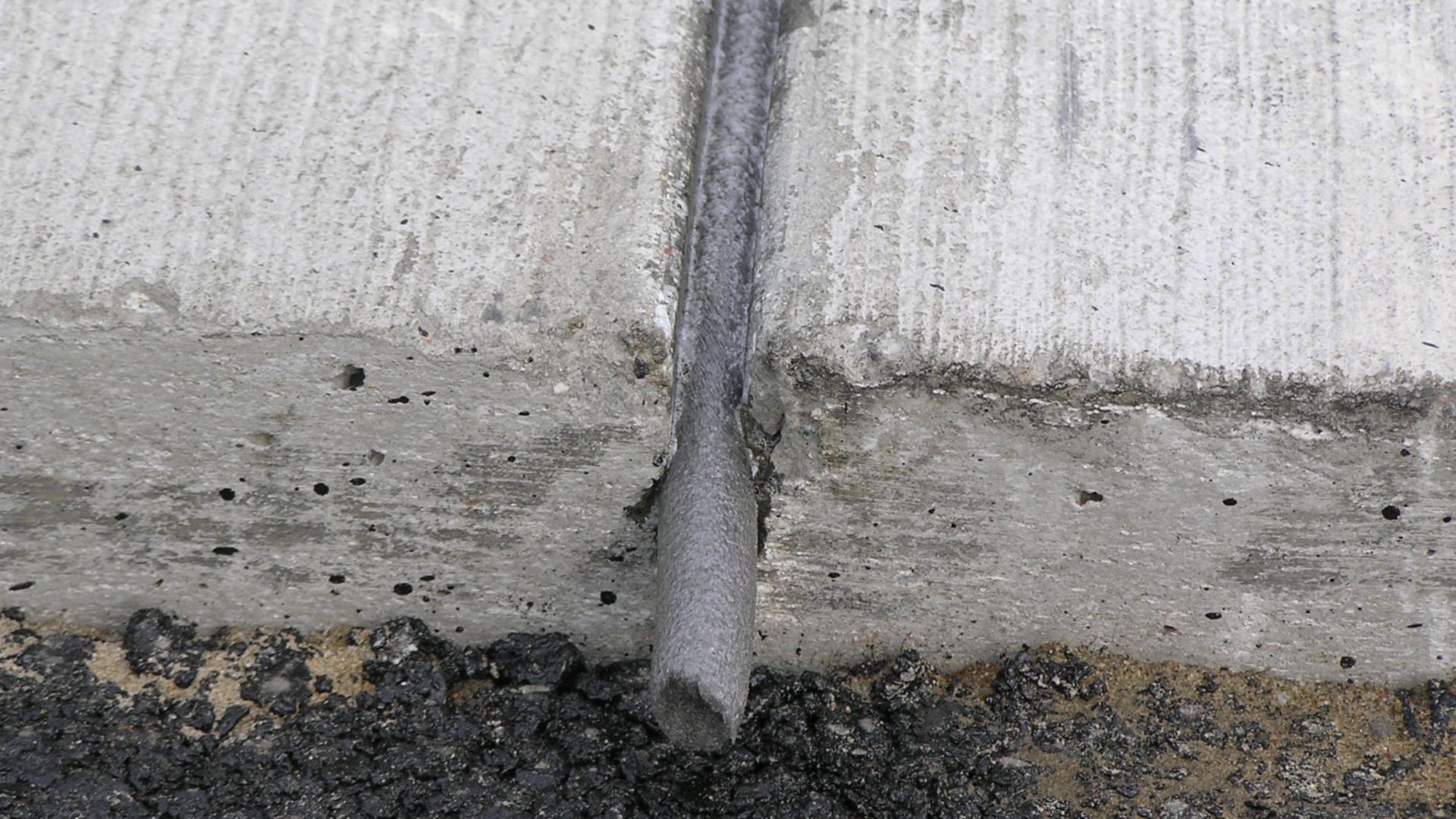 Backer rod and joint sealant in concrete road in Poland