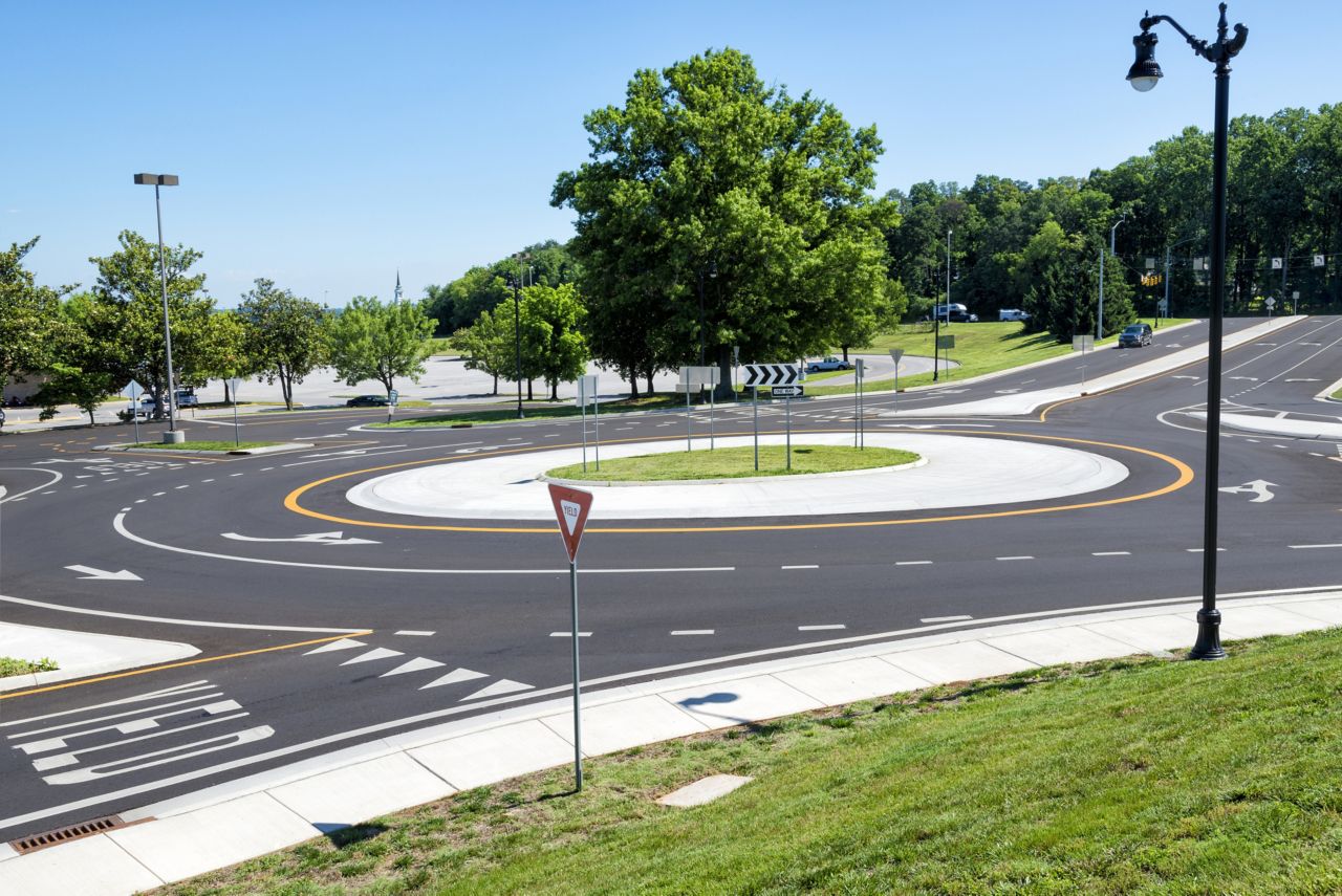 Road roundabout with trees and grass