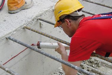 Man applying Sikaswell joint Waterproofing