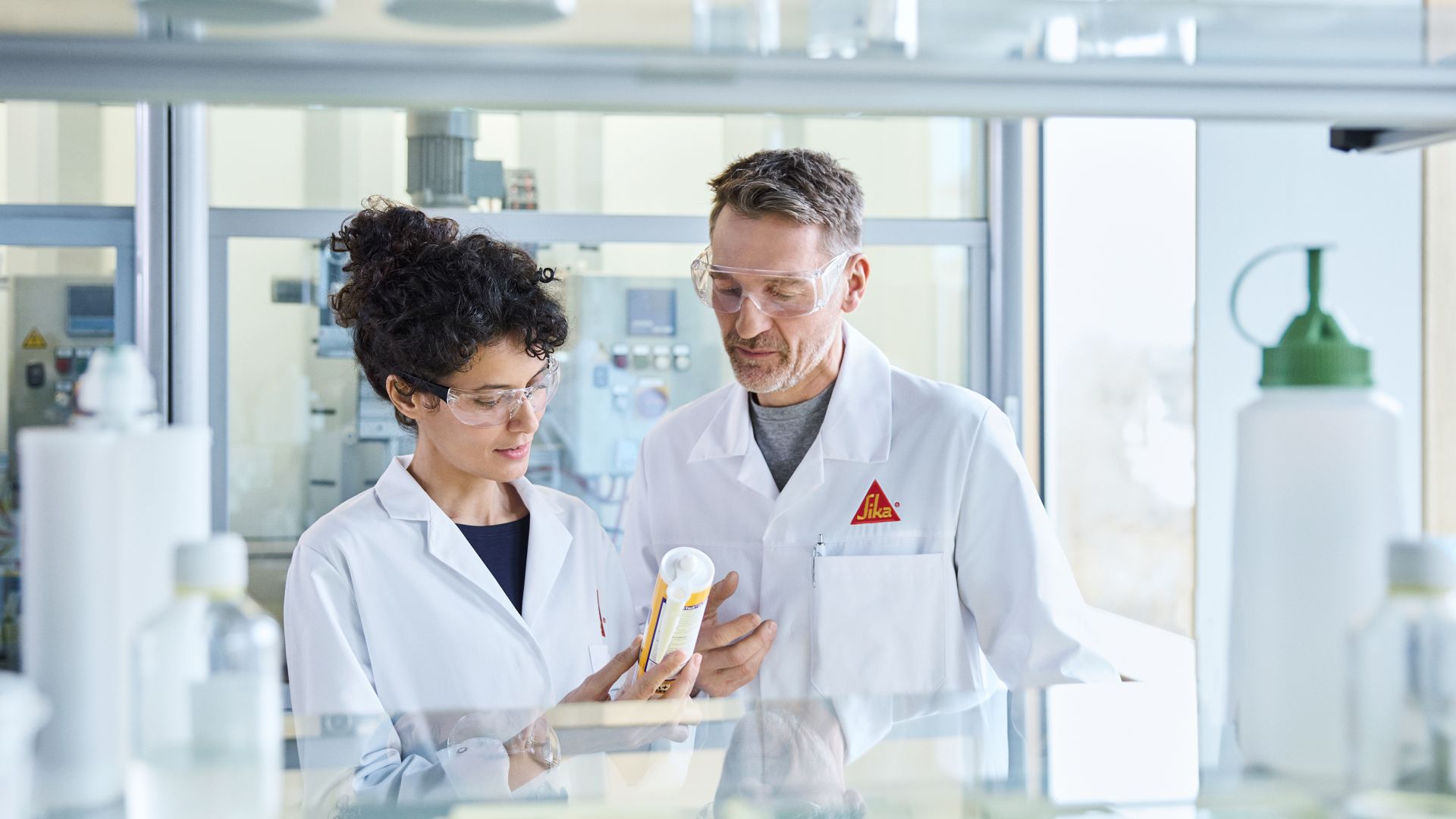 Two researchers in a Sika lab in Switzerland