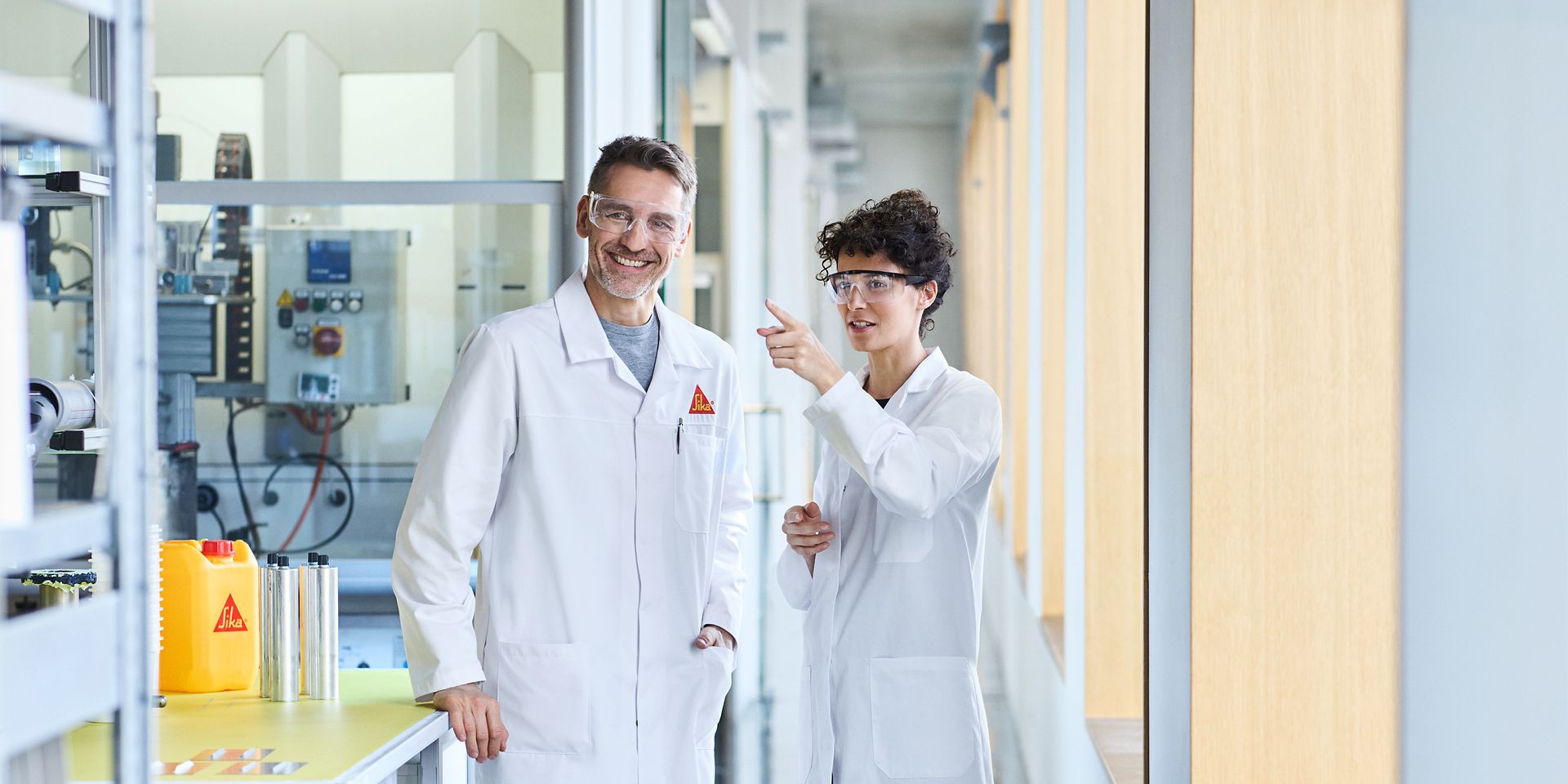 Two researchers in a Sika lab in Switzerland