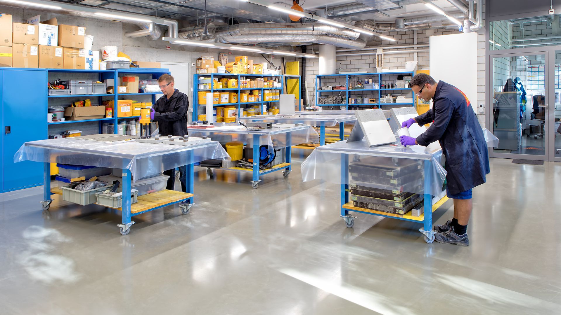 Sika employees working in a lab in Sika office building in Zurich 