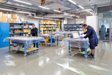 Sika employees working in a lab in Sika office building in Zurich 