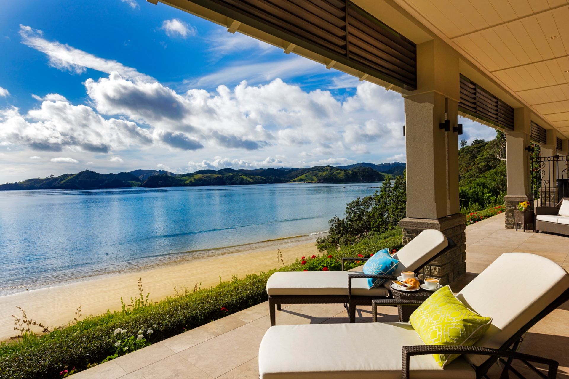 Trace with Helena Bay view in luxury lodge in New Zealand