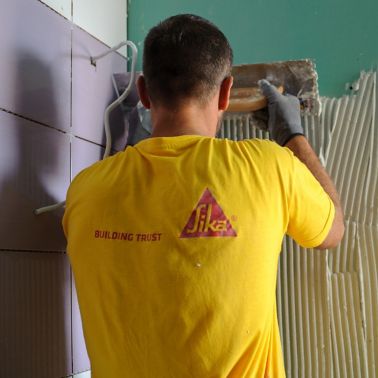 Man tiling at the Epirus Sport and Health Center in Ioannina, Greece